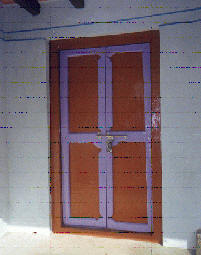 House with RCC door frame and wooden shutters