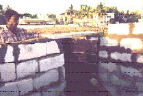 Placing the stone lintel and applying mortar