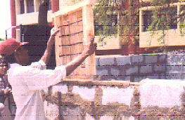 Placing window frame with cement mortar