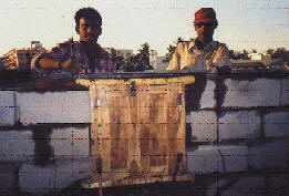 Placing stone lintel above window frame